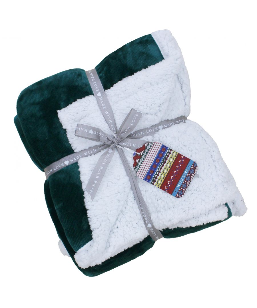 Prepare yourself for the holiday season with the Paoletti Luxe Sherpa fleece throw. Created with luxurious 220gsm microfleece for a super soft velvet feel front that emanates an opulent sheen. With a 250gsm Sherpa sheepskin reverse in optic white you'll be keeping toasty warm all night long. Serving as the perfect gift this throw is beautifully presented with a ribbon trim and comes complete with a festive Christmas tag. In a range of rich colours you'll find a choice to suit any home whether you're giving it as a gift or to dress up your own interior. Made of 100% hard-wearing polyester this faux fur throw can withstand the busiest of households whether you have children or pets. This gorgeous throw is incredibly easy to care for as it is fully machine washable at 30 degrees. Do not iron and lay flat to dry for the best results.