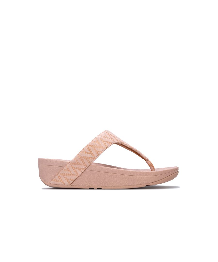 Womens FitFlop Lottie Chevron Suede Toe Thong Flip Flops in oyster pink.<BR><BR>Biomechanically engineered  comfortable wedge sandals.<BR>- Soft  foil print suede upper with tonal chevron design.<BR>- Slip-on toe post construction. <BR>- Comfortable  lightly padded microfibre-lined upper.<BR>- Microwobbleboard midsole - absorbs shock  diffuses pressure and provides extraordinary comfort.<BR>- Built-in arch contour.<BR>- Embossed FitFlop branding to footbed.<BR>- Standard Microwobbleboard midsole provides a slightly narrow yet generous fit.  Perfect for average feet that like a looser fit.<BR>- Heel height 1.75“ - 4.5cm approximately.<BR>- Suede upper  Textile and synthetic lining  Synthetic sole.<BR>- Ref: R18-673<BR><BR>Measurements are intended for guidance only.
