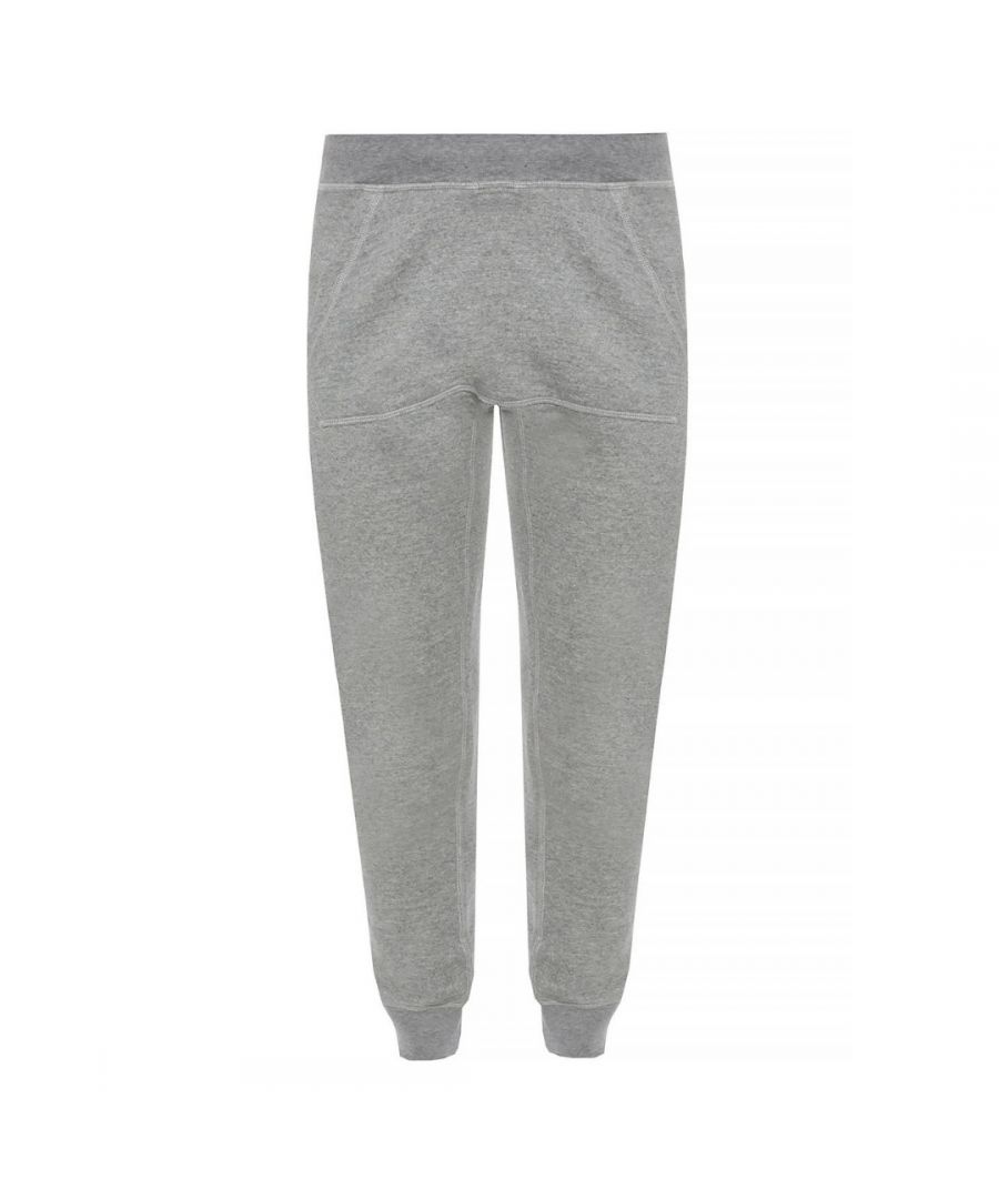 Dsquared2 losvallende grijze joggingbroek met logo. Dsquared2 S71KB0169 S25401 961 grijze joggingbroek. Gemaakt in Italië, 100% katoen. Losjes. Geboeide taille en bodems. Branding op achterzak