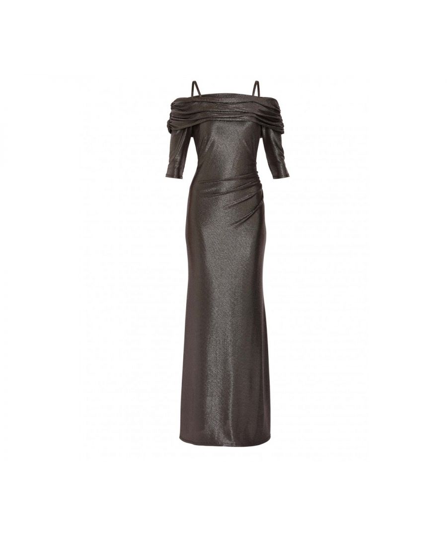 Feel dazzling in this gorgeous dress by Gina Bacconi. Perfect for a party or special occasion, the dress is fashioned from a lightweight metallic jersey. With gorgeous cut out shoulder detailing and ruches at the side of the waist. The dress has 3'4 length sleeves and is fully lined.