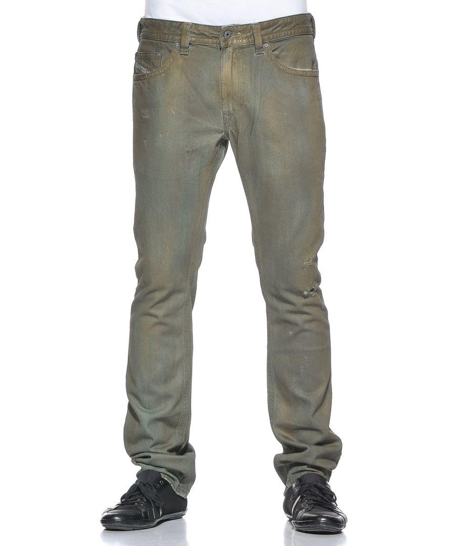 Diesel Thavar 0807J spijkerbroek. Verontrust en vervaagd. Limited Edition Wash. Gemaakt in Italië. Groen en goud behandeld denim. Versleten look met Destroyed Denim