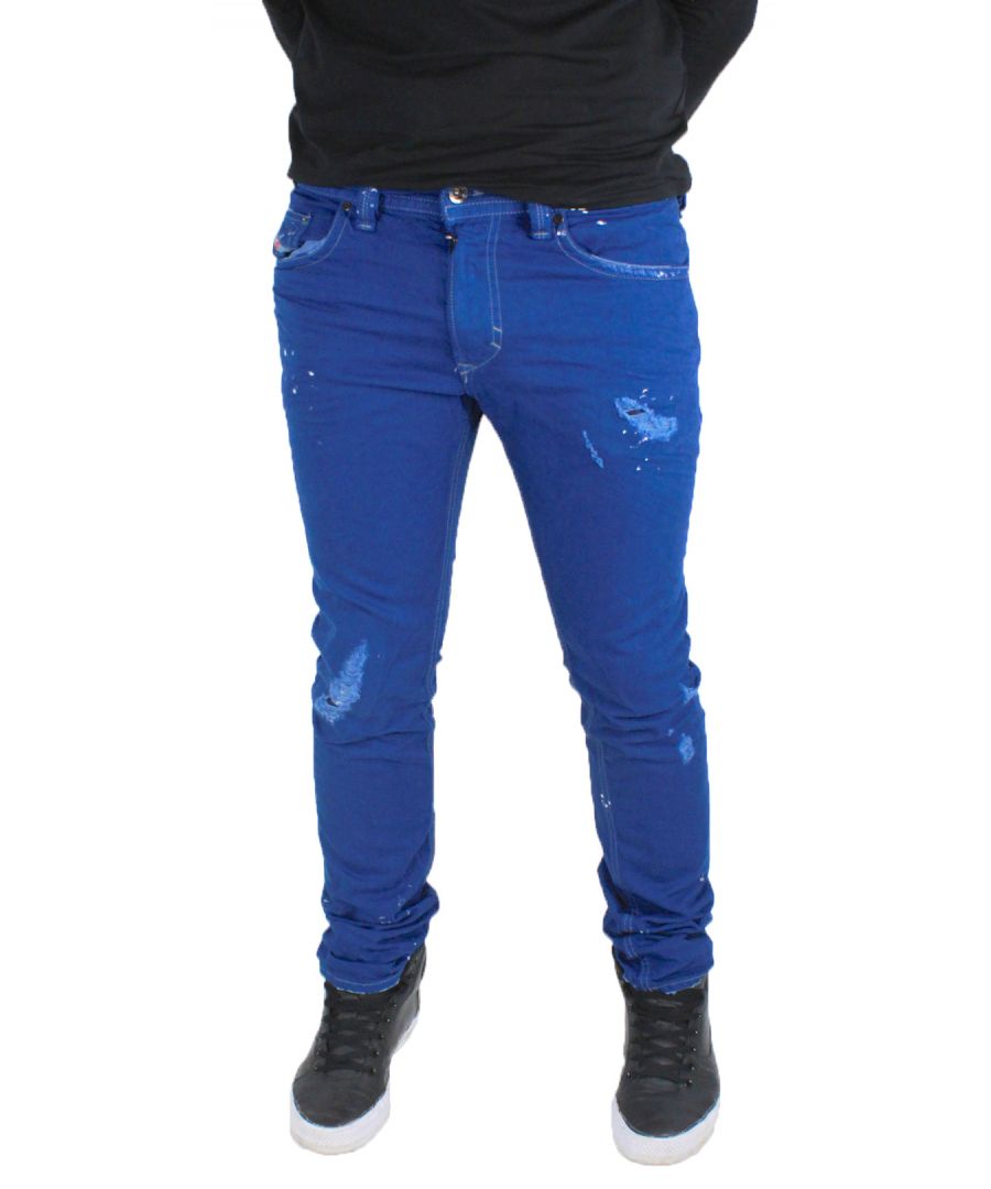 Diesel Thavar 0852D 8EK Jeans. Gemaakt in Italië. 100% katoen. Gebieden van gerafeld denim. Rits sluiting. Strakke pasvorm