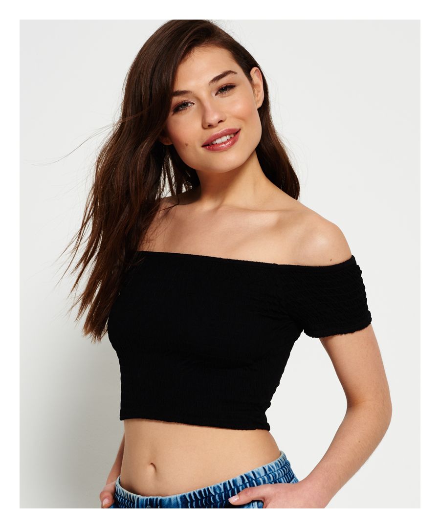 Superdry women’s shirred Bardot top. This cropped Bardot top in a stretchy shirred fabric is a feminine off the shoulder look for your summer wardrobe. Model wears: Small Model height: 5’ 11” (180cm)