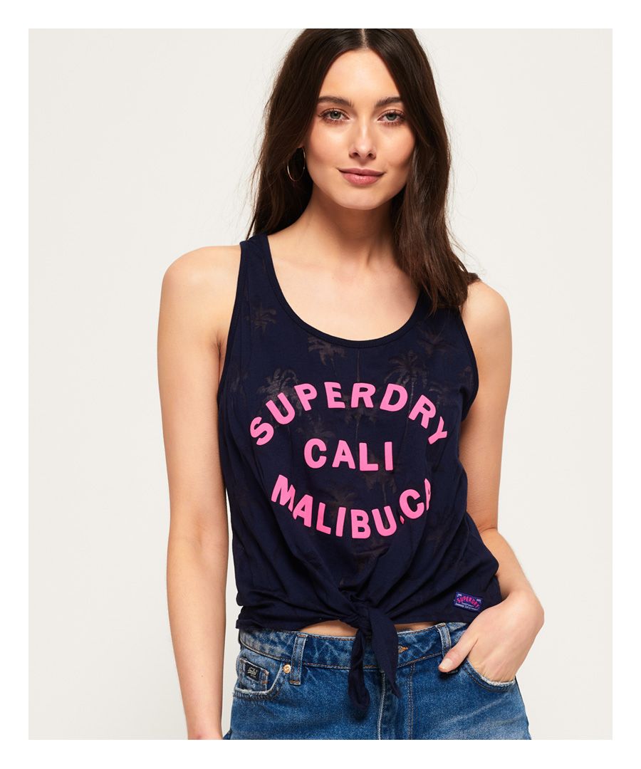 Superdry women’s Surf Beach tank top. The ultimate summer essential, featuring a textured Superdry logo across the chest, tie detailing and finished with a Superdry logo badge just above the hem.