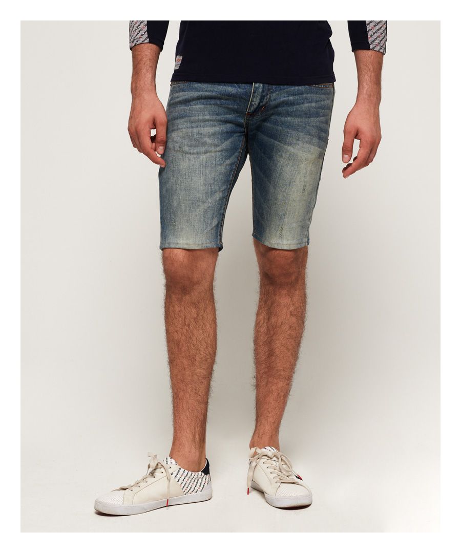 Superdry men’s Skinny shorts. These shorts feature a five pocket design and a zip fly fastening and an embroidered Superdry logo on the coin pocket. These shorts have been finished with an embossed leather logo patch on the back waistline and Superdry branded rivets throughout.