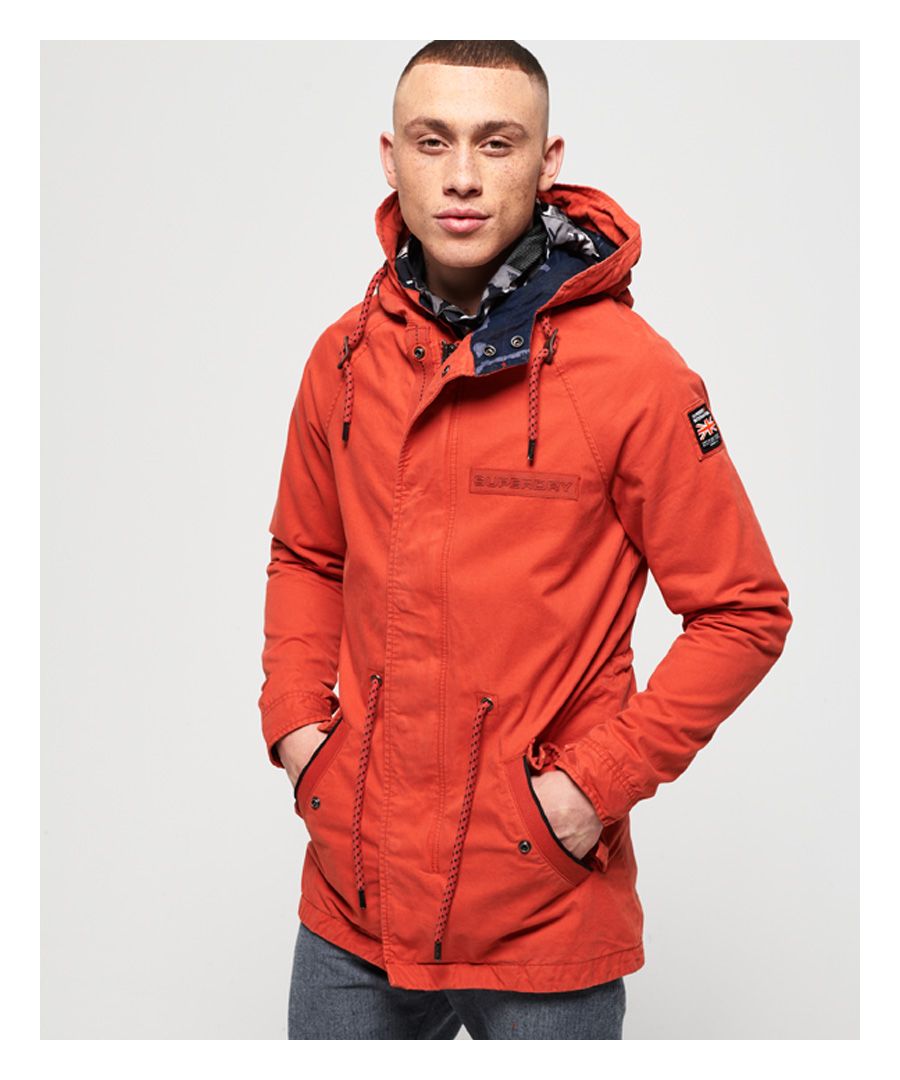 Superdry men's Aviator Rookie parka jacket. This classic parka jacket features a drawstring adjustable hood, zip and popper fastening and popper cuffs. An adjustable drawstring waist means you can create your perfect fit, while logo badges on the chest and sleeve add that finishing touch.