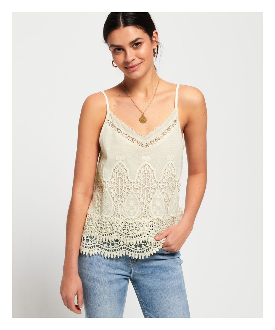 Superdry women's Amanda cami top. This top features a crochet design across the front, adjustable shoulder straps and a panelled design on the back. Finished with a metal Superdry logo badge on the hem. This top is perfect for the warmer weather and will look great paired with jeans or shorts.