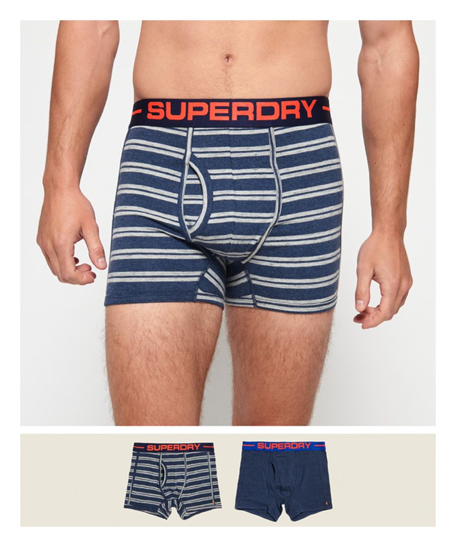 Superdry men's Sport boxers double pack. These boxer shorts have been designed with your comfort in mind, featuring a panelled design, Superdry branded waistband and the iconic orange stitch in the side seam. The boxers are completed with a Superdry logo tab on the back of the waistband. This pack contains two Sport boxer shorts.Please note due to hygiene reasons, we are unable to offer an exchange or refund on underwear, unless they are sealed in their original packaging. This does not affect your statutory rights.