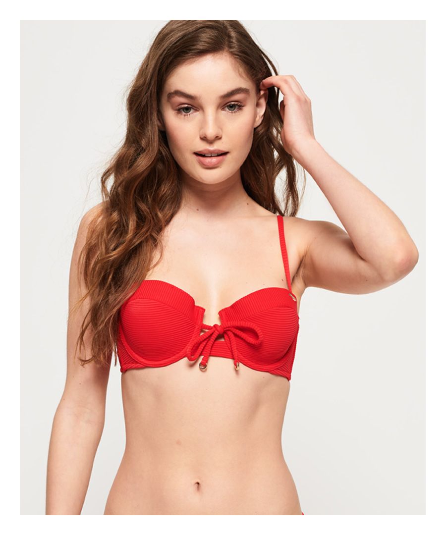 Superdry women's Alice textured cupped bikini top. Take the plunge this season in the Alice bikini top, with detachable, adjustable straps, a rear clasp fastening and knot detailing on the front. This bikini top is completed with a logo badge on the cup.Matching bottoms available.Please note due to hygiene reasons, we are unable to offer an exchange or refund on swimwear, unless they are sealed in their original packaging. This does not affect your statutory rights.