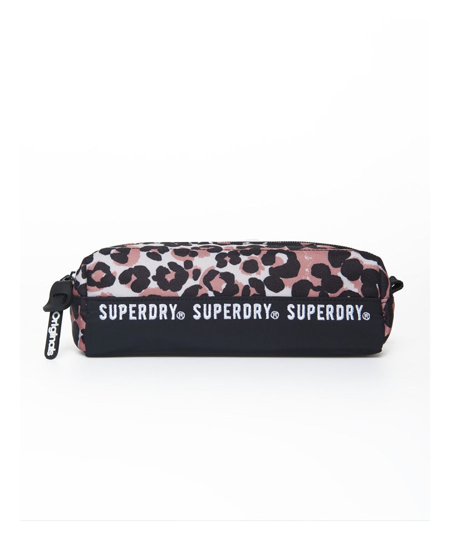 Superdry women's Montana pencil case. Carry your stationery essentials in style with the Montana pencil case. This pencil case has been designed with an all over daylight reactive print. Completed with a rubber Superdry logo badge on the front.L 24cm x H 8cm x D 8cm