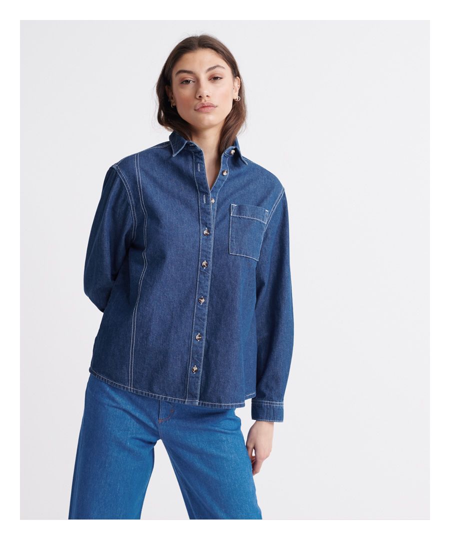 Womens Superdry Alchemy Classic Denim Shirt in denim.- Pointed collar.- Full button fastening.- Long sleeves with buttoned cuffs.- Chest pockets.- 100% Cotton.- Ref: W4010011AM6M