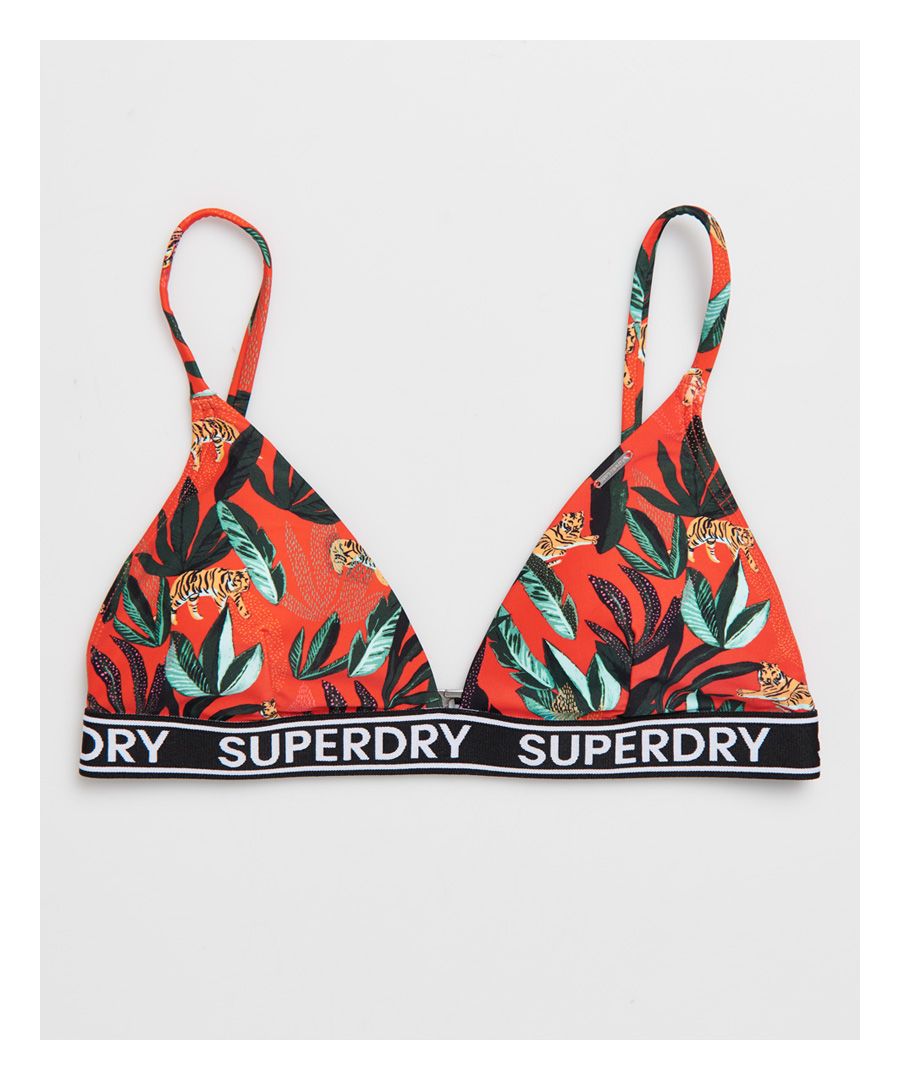 Superdry women's Jungle Fixed Tri bikini top. This top features two adjustable straps, a hook fastening, removable padding and a Superdry logo elasticated waistband. Pair with the matching bikini bottoms to complete the look.Please note due to hygiene reasons, we are unable to offer an exchange or refund on swimwear, unless they are sealed in their original packaging. This does not affect your statutory rights.