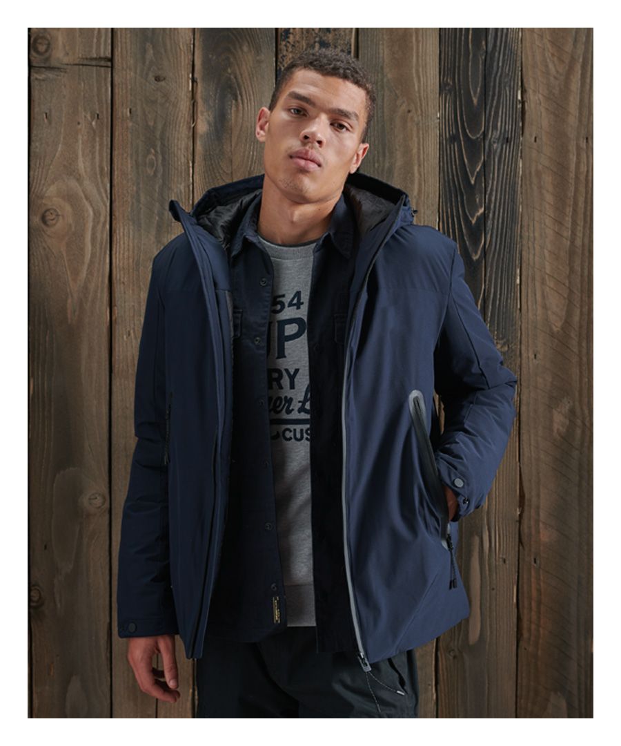 Designed to be sustainably friendly, the Pro Elite Jacket features 100% recycled polyester padding, provided to keep you warm and cosy this season. Also featured is three zip fastened pockets, perfect for storing your essentials when on your travels. Layer up over a basic hoodie with jeans to complete the look.Main coated zip fasteningBungee cord adjuster hood and hemTwo external zip pocketsOne internal breast pocket with zip fasteningPopper cuffsRecycled polyester paddingSignature logo badgeThe padding in this jacket is 100% Recycled Polyester – each jacket contains up to 10 recycled bottles, this avoids these bottles being sent to landfill or polluting our oceans.