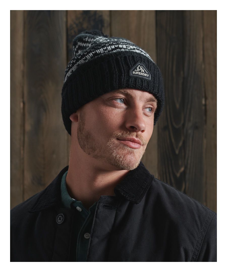 Make a statement in our Fairisle beanie, with a bold pattern and fluffy bobble on top.Fairisle knitFold up hemBobbleSignature logo patch