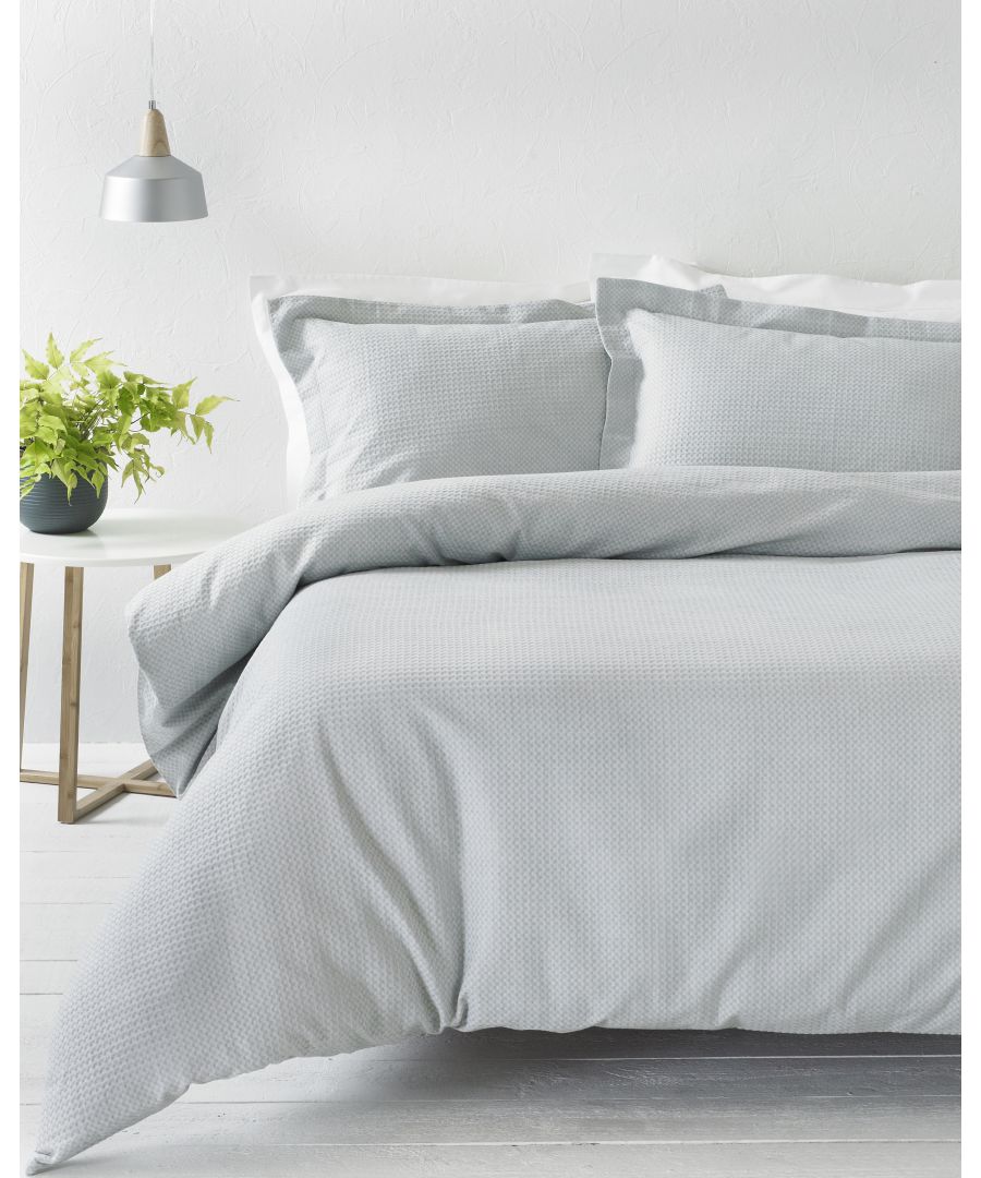 The Waffle duvet set is made of 100% soft cotton, woven on a loom making it a very durable fabric. It’s unique three dimensional design gives it a large surface area to keep you snug and warm on cold evenings while also being breathable for warmer weather. This full bodied duvet set comes with large matching pillowcases complete with an oxford border for that extra touch of luxury. The duvet cover set has a secure button closure while the pillowcases feature a simple envelope closure to keep your pillow safely in place. For the best finish machine wash at 40 degrees. Tumble dry on a low setting and use a hot iron.