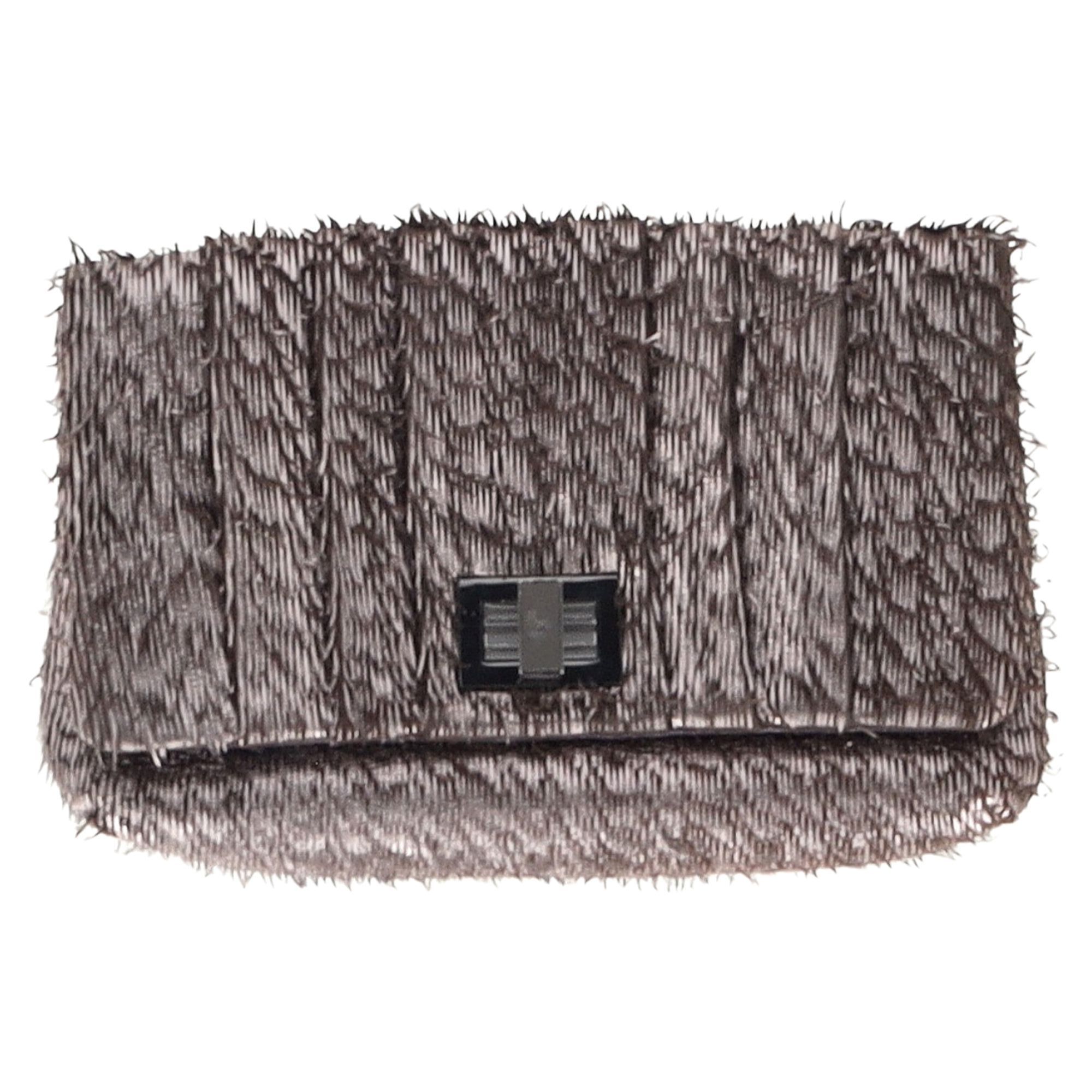Anya Hindmarch Pre-owned Anya Hindmarch Rosalyn Fringed Clutch Bag in Metallic Grijs Leer