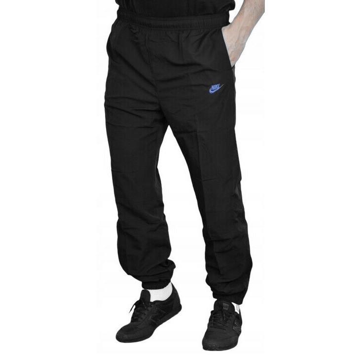 Thumbnail - Nike Leichte, gewebte Trainingshose für Herren Schwarz/Blau